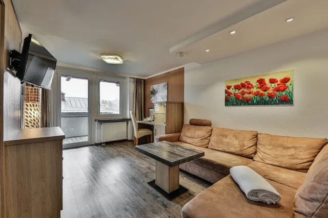 Superior appartement met 1 slaapkamer, 1 woonkamer, balkon en uitzicht op de bergen — Alpenhotel Fischer