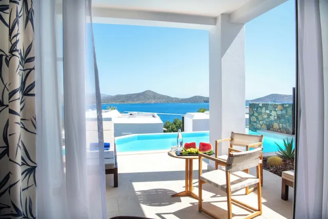Bungalow Mythica ze wspólnym basenem i widokiem na morze — Aquila Elounda Village Resort