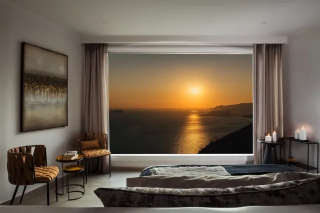 Grotvilla Athermi - binnenzwembad en uitzicht op de zonsondergang — Athermi Suites