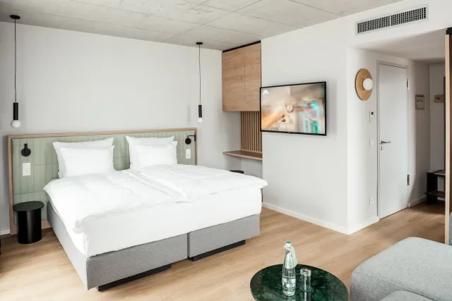 Junior-værelse med 1 kingsize seng, røgfrit — Coreum Hotel