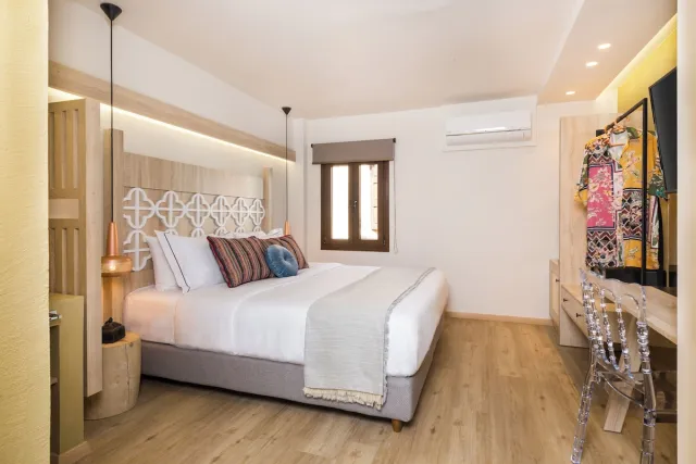 Deluxe met jacuzzi en terras — Cressa Suites