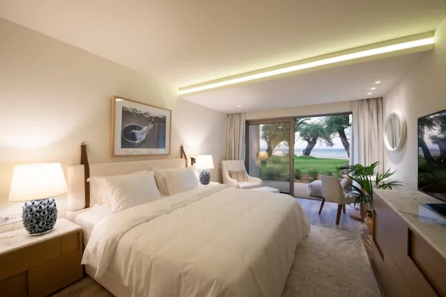 Kamer met 1 kingsize bed direct aan het strand (Emerald Retreat direct aan het strand) — Domes Miramare