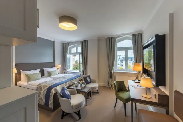 Comfort tweepersoonskamer met uitzicht op de stad — Hotel Am Leuchtturm