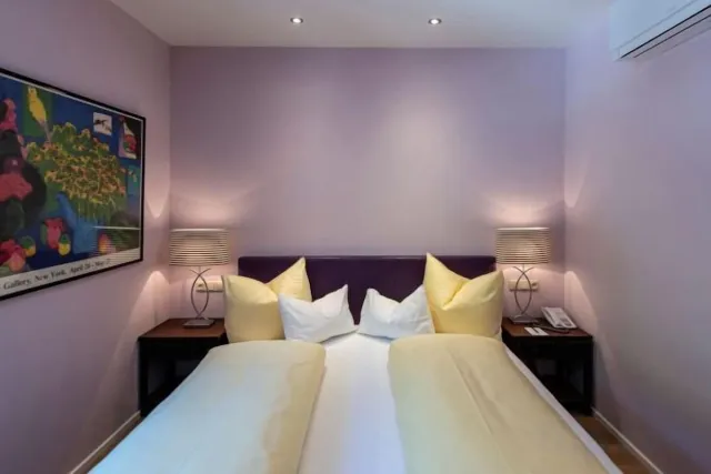 Economy tweepersoonskamer, Standard tweepersoonskamer met uitzicht op de bergen — Hotel Cortisen am See