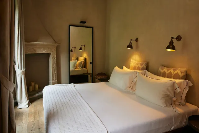 Pokój dwuosobowy Deluxe z 1 łóżkiem king size i widokiem na ogród — Relais Castello di Morcote - Adults only