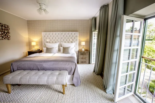 Junior suite met uitzicht op het park — Weissenhaus Private Nature Luxury Resort